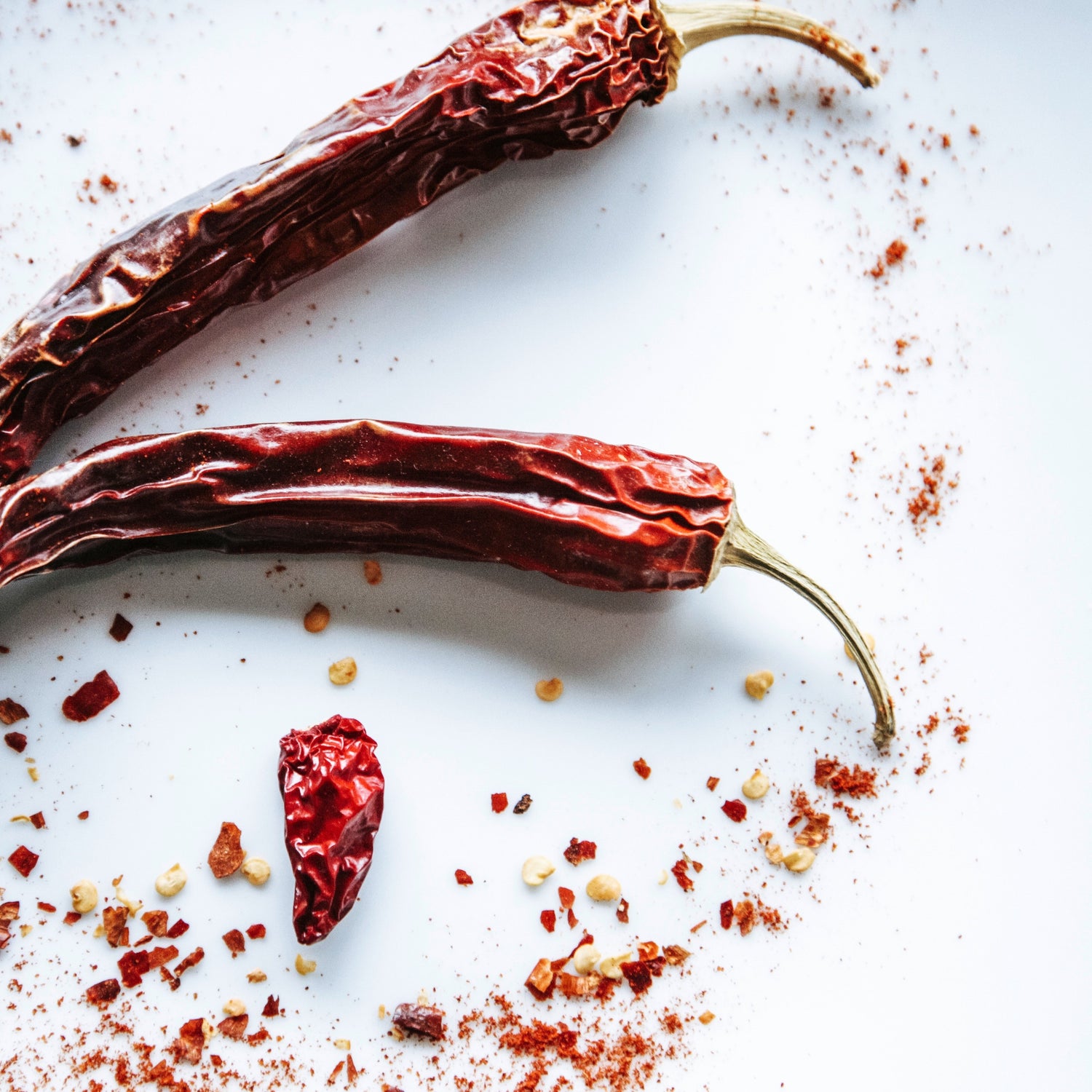 dried chili peppers on a white background